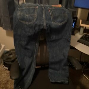 Blue Levi’s style 501 button fly jeans